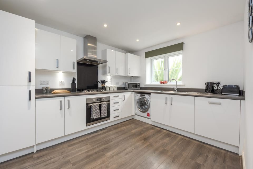 Kitchen or kitchenette, oven, stove, toaster