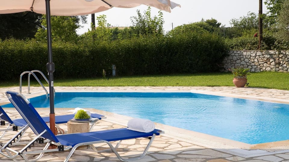 Property building, Living room, Swimming pool
