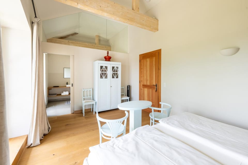 Bed, Photo of the whole room, Seating area, Bedroom, towels, wardrobe
