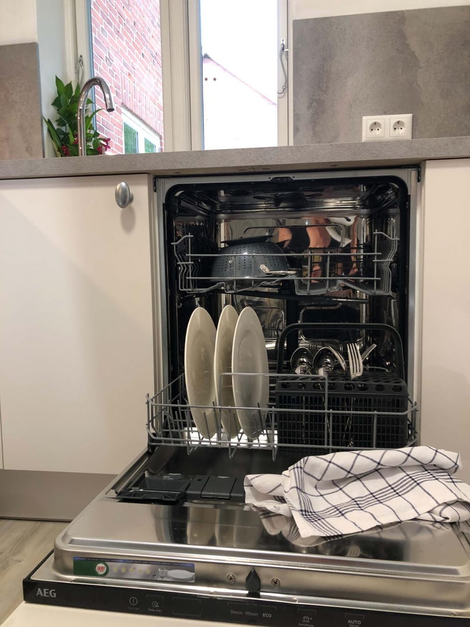 Kitchen or kitchenette, dishwasher, microwave, towels, kitchen, kitchen