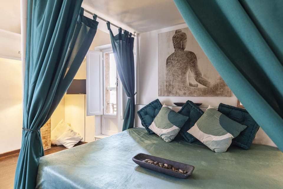 Bed, Living room, Seating area, Bedroom