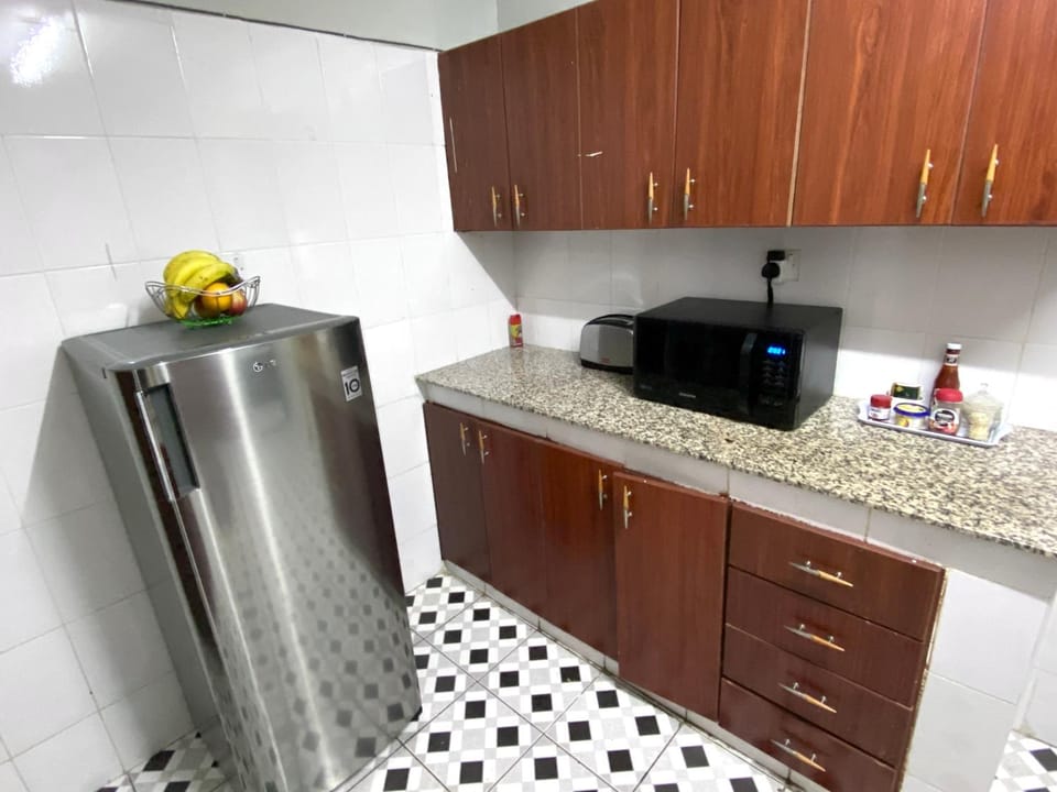 Kitchen or kitchenette, oven, stove, toaster