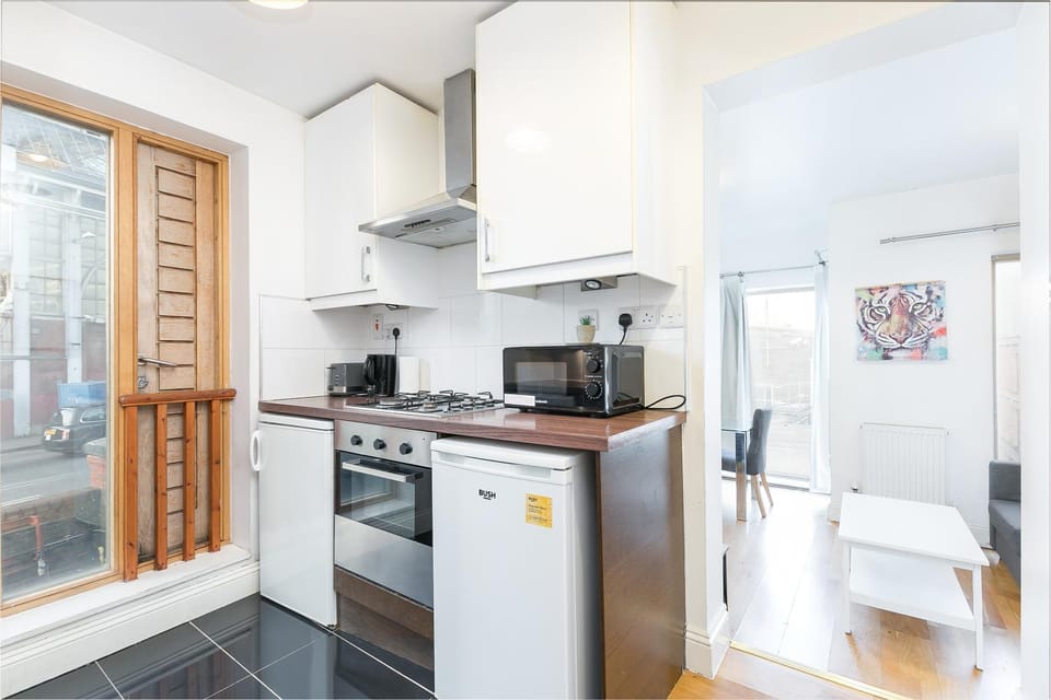 Kitchen or kitchenette, oven, stove, toaster