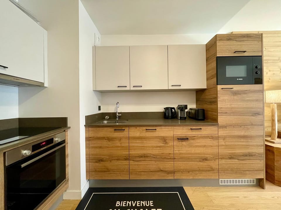 Kitchen or kitchenette, oven, stove, toaster