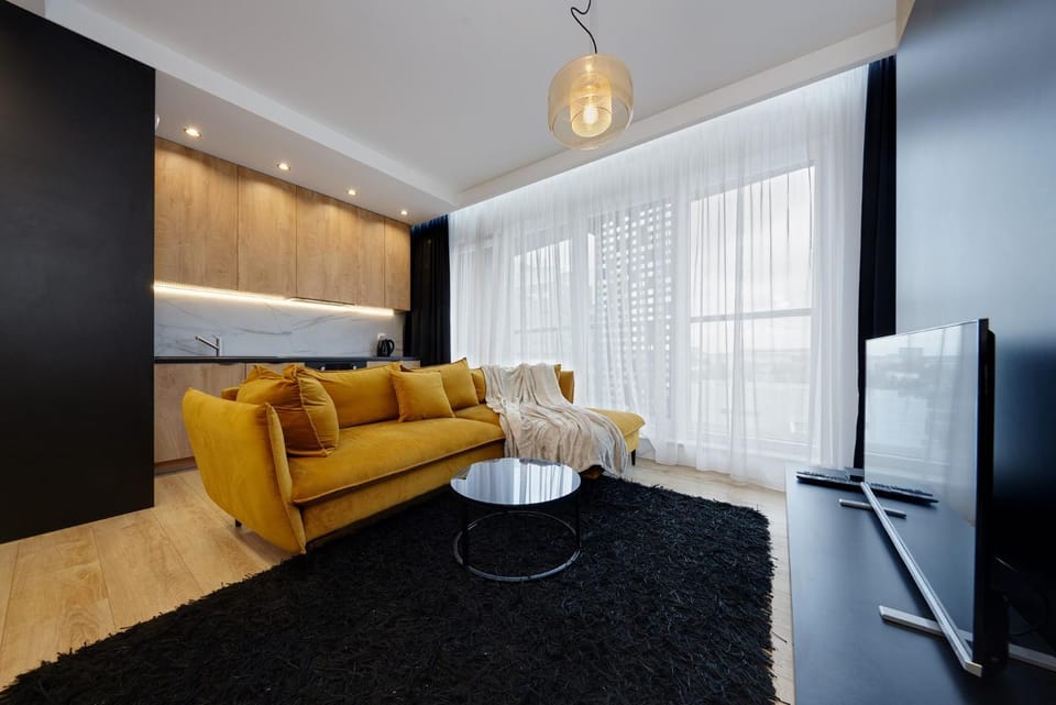Bed, TV and multimedia, Kitchen or kitchenette, Living room, Photo of the whole room, Seating area, Bedroom
