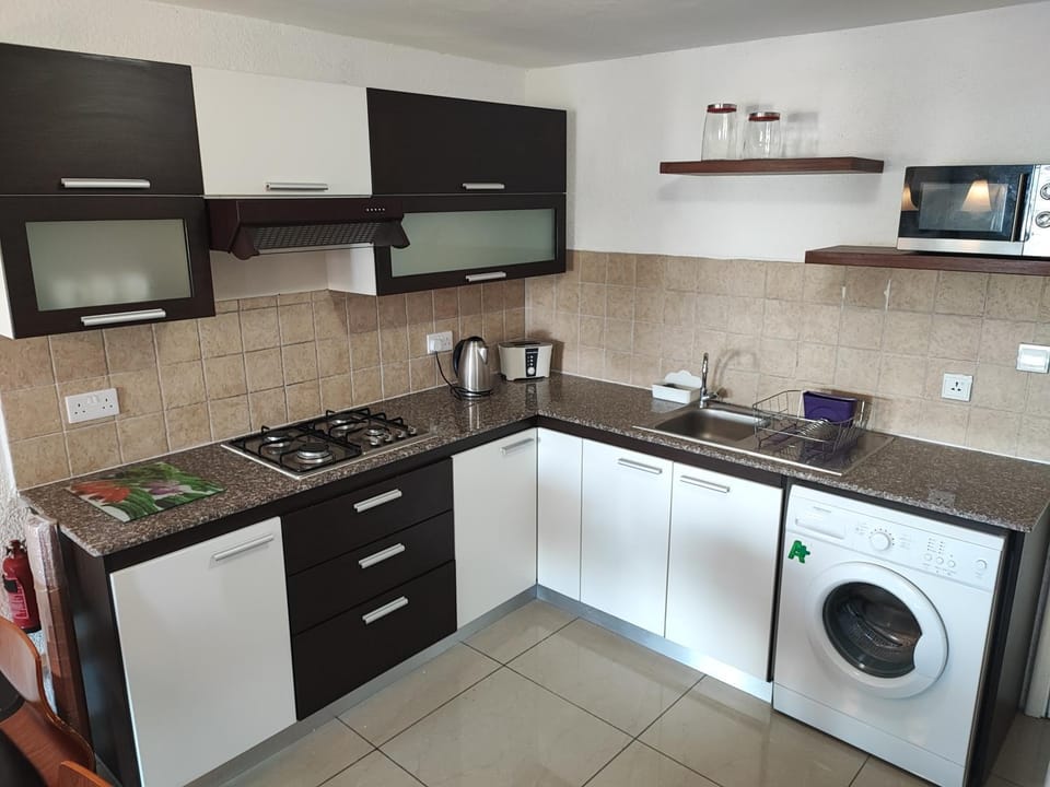microwave, stove, washing machine, kitchen