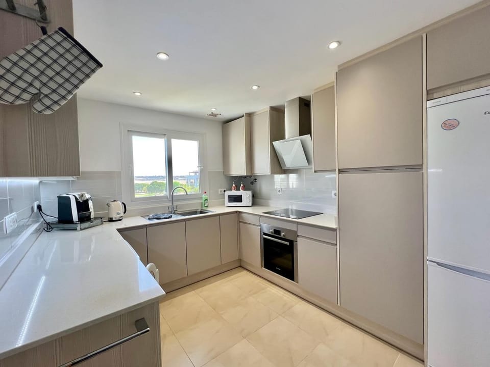 Kitchen or kitchenette, oven, stove