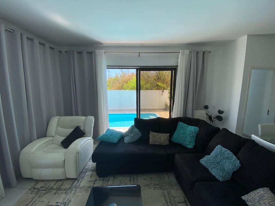 Living room, Seating area, Pool view, Swimming pool