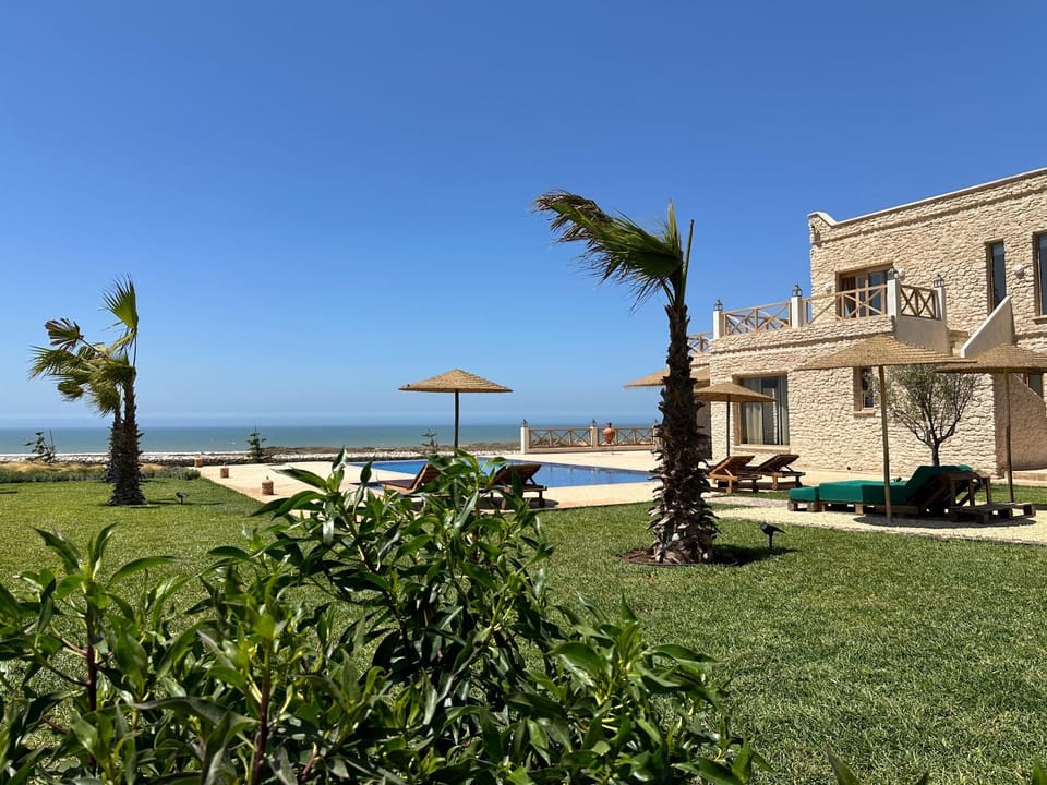 Property building, Natural landscape, Garden, Beach, Garden view, Pool view, Sea view, Swimming pool, sunbed