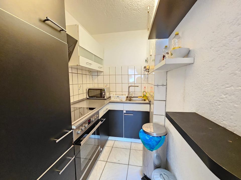 Kitchen or kitchenette, oven, stove