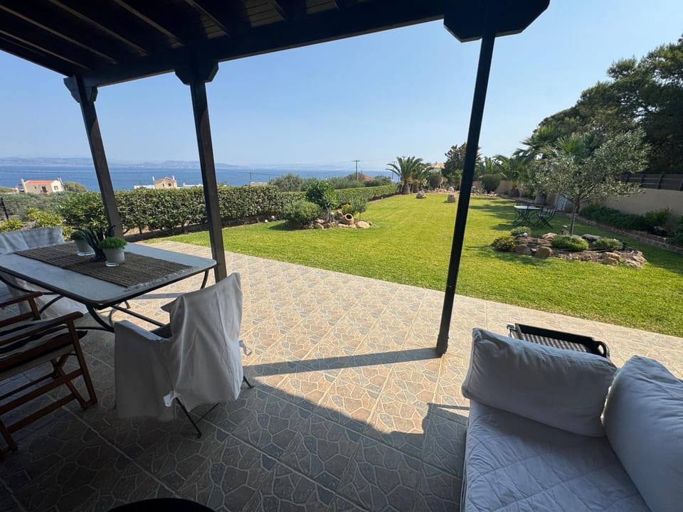 Patio, Day, Natural landscape, Garden, View (from property/room), Dining area, Garden view, Sea view