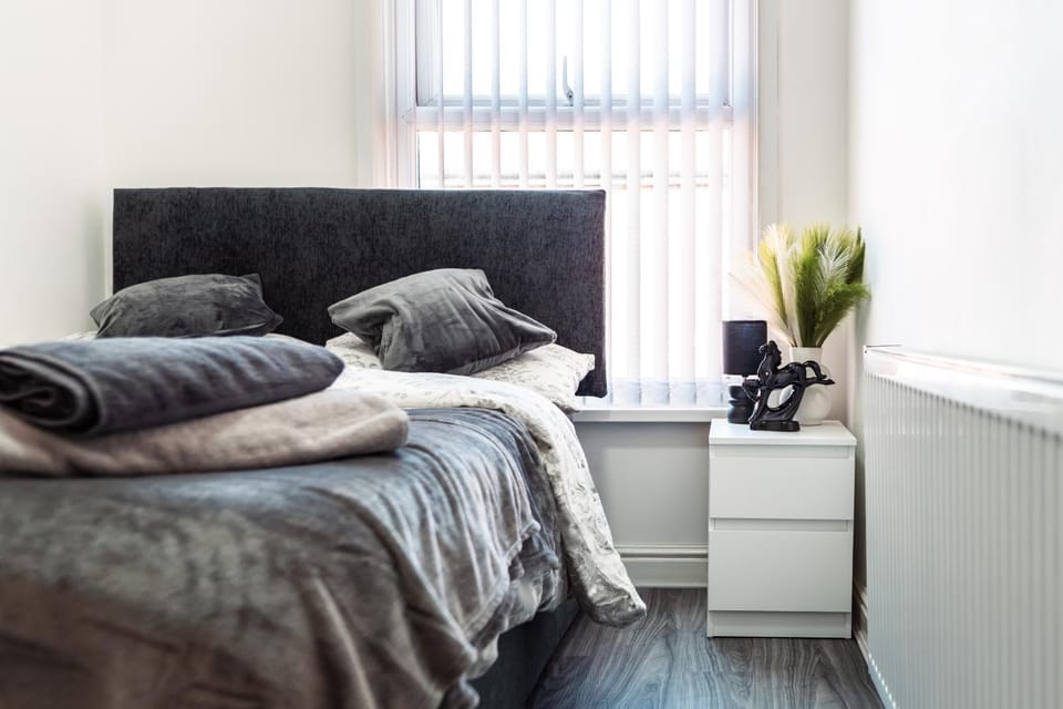 Bed, Bedroom, flat iron, hair dryier, towels