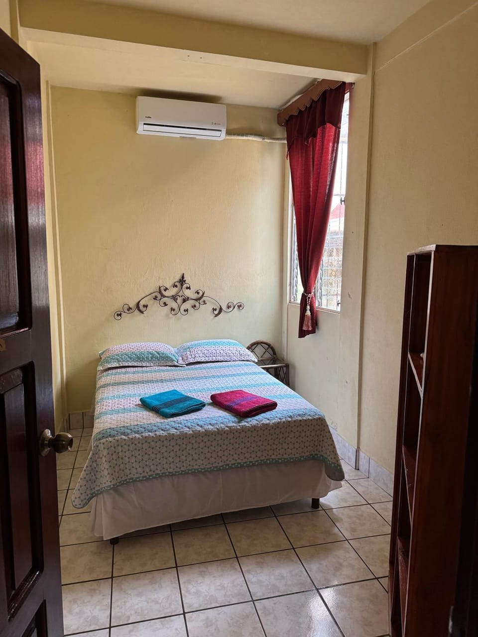 Bed, Photo of the whole room, Bedroom, towels, air conditioner