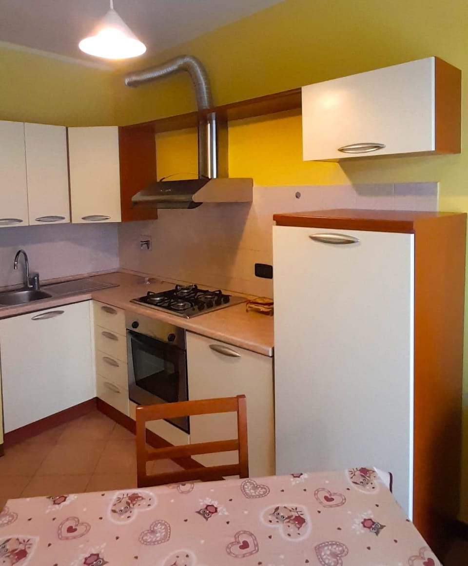 Kitchen or kitchenette, oven, stove