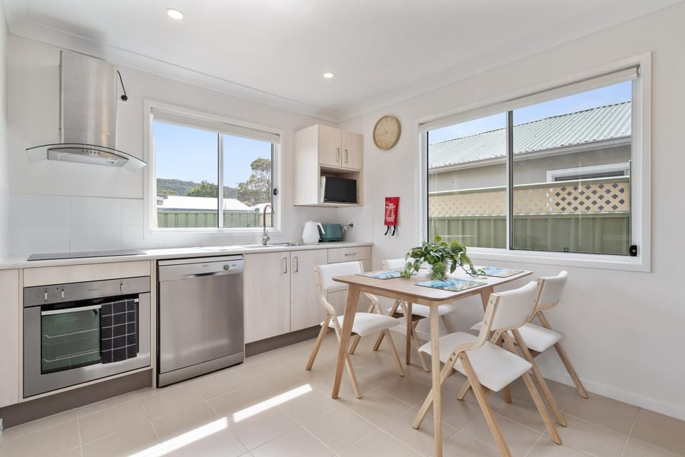 Kitchen or kitchenette, Dining area, dishwasher, oven, stove, toaster