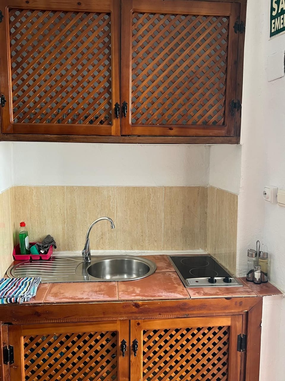 Kitchen or kitchenette, stove