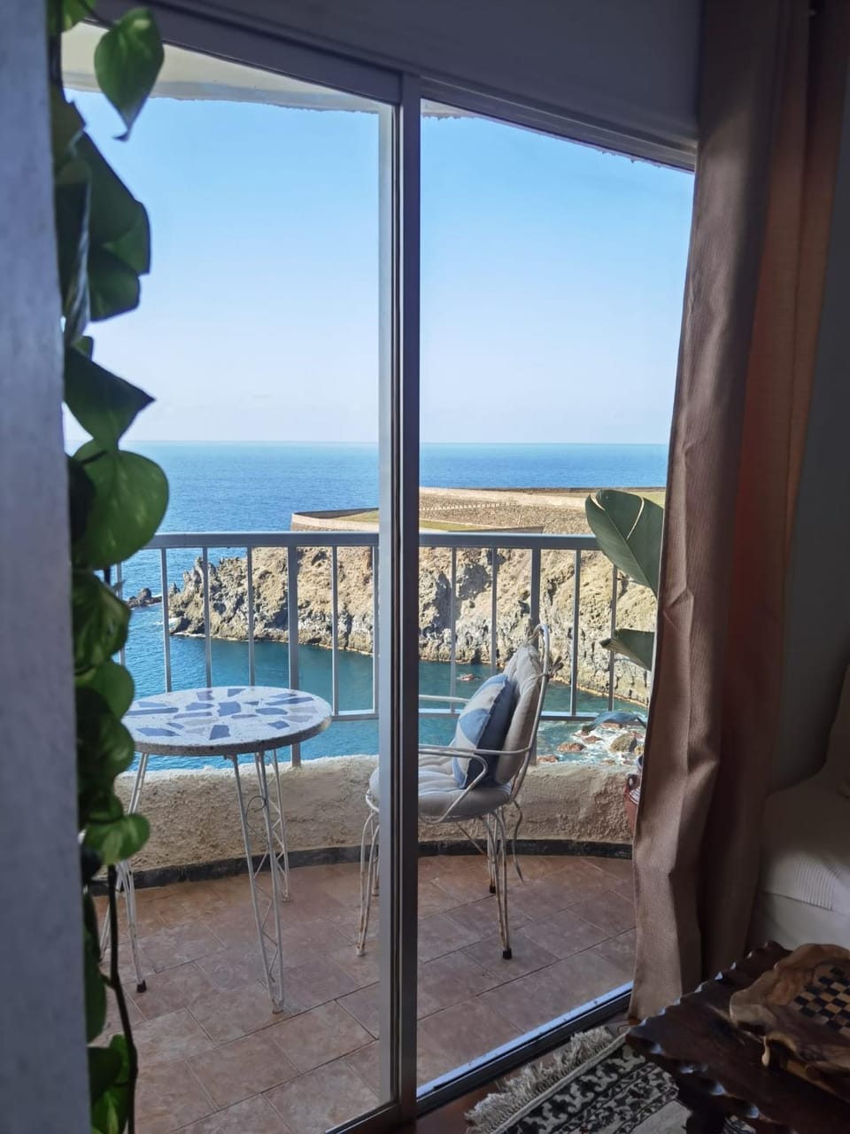 Patio, Day, Natural landscape, View (from property/room), Balcony/Terrace, Living room, Seating area, Dining area, Pool view, Sea view, Swimming pool, sunbed