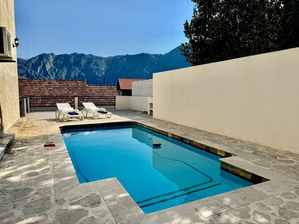 Day, Natural landscape, Mountain view, Swimming pool, sunbed