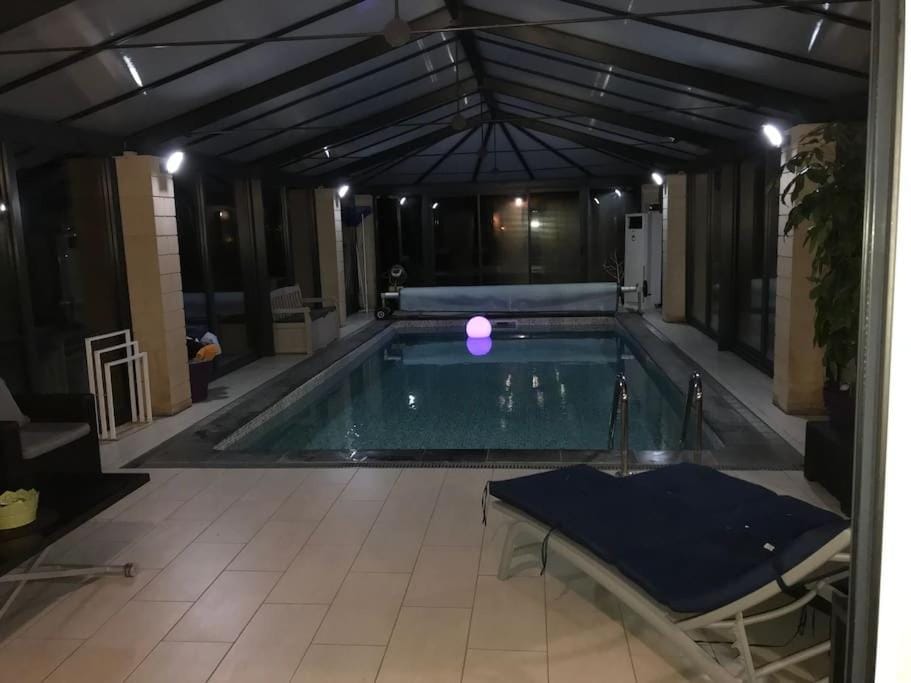 Night, Pool view, Swimming pool, sunbed