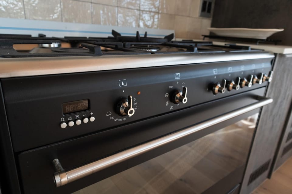 Kitchen or kitchenette, stove
