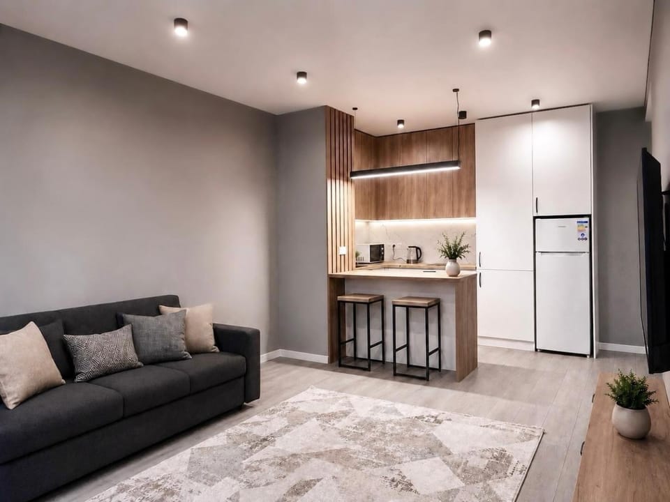 Coffee/tea facilities, Kitchen or kitchenette, Living room, Seating area, stove