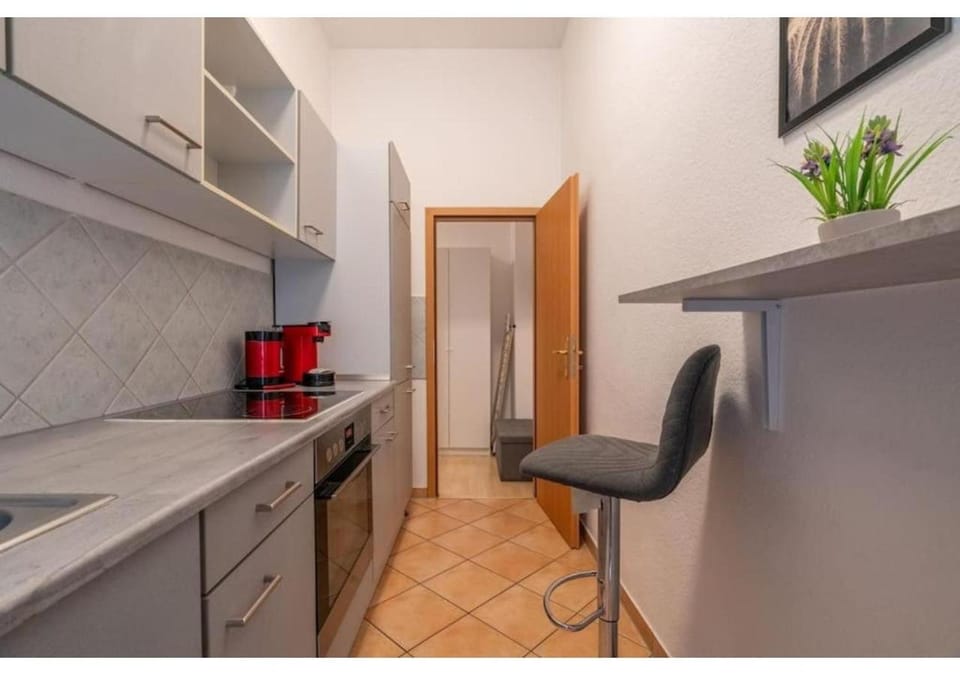 Kitchen or kitchenette, stove, kitchen