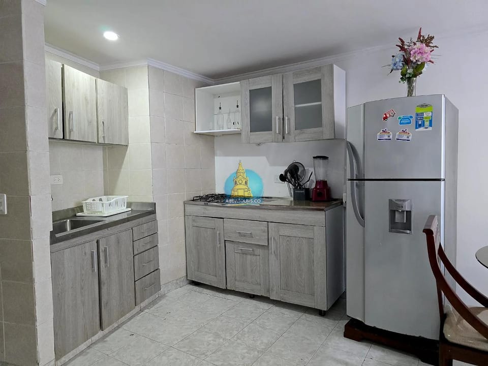 Kitchen or kitchenette, dishwasher, stove