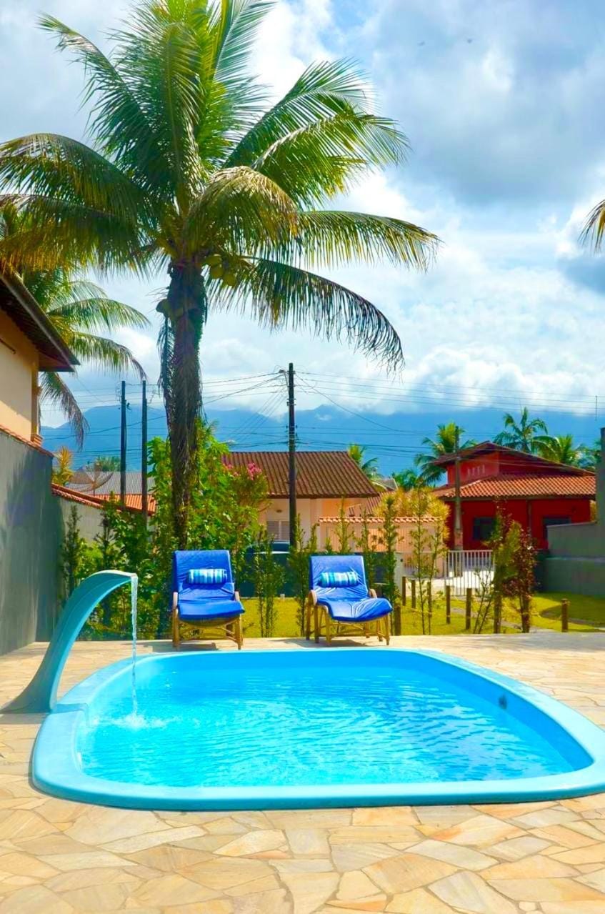 Casa com piscina 500m da praia condomínio Morada da Praia House in Bertioga