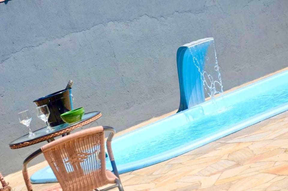 Casa com piscina 500m da praia condomínio Morada da Praia House in Bertioga