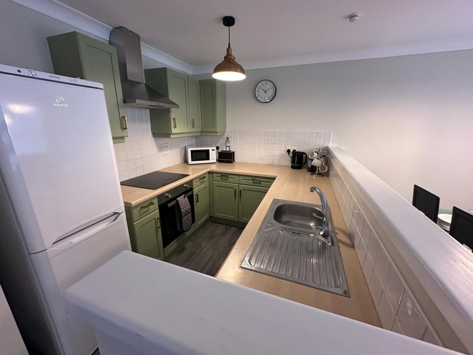 Kitchen or kitchenette, oven