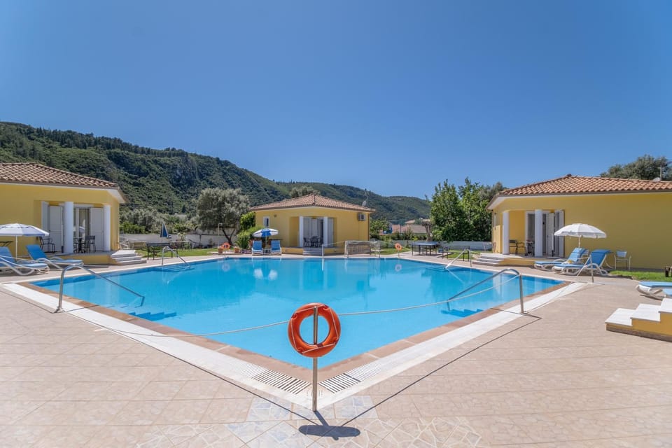 Property building, Living room, Swimming pool