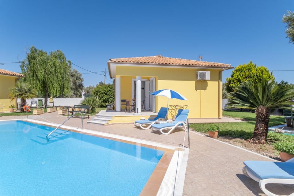 Property building, Living room, Swimming pool