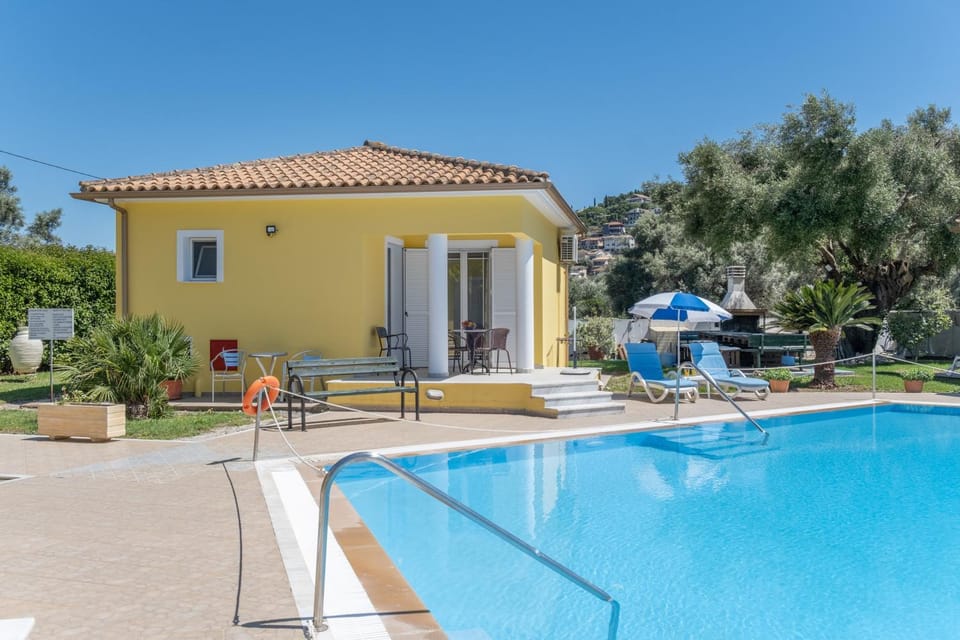 Property building, Living room, Swimming pool