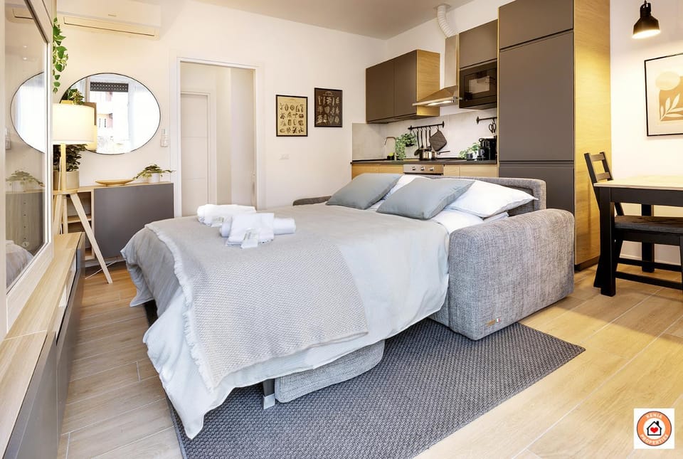Bed, Kitchen or kitchenette, towels, air conditioner