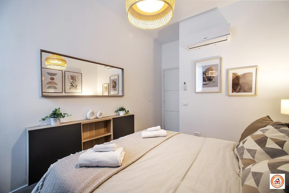 Bed, Photo of the whole room, Bedroom, towels, air conditioner