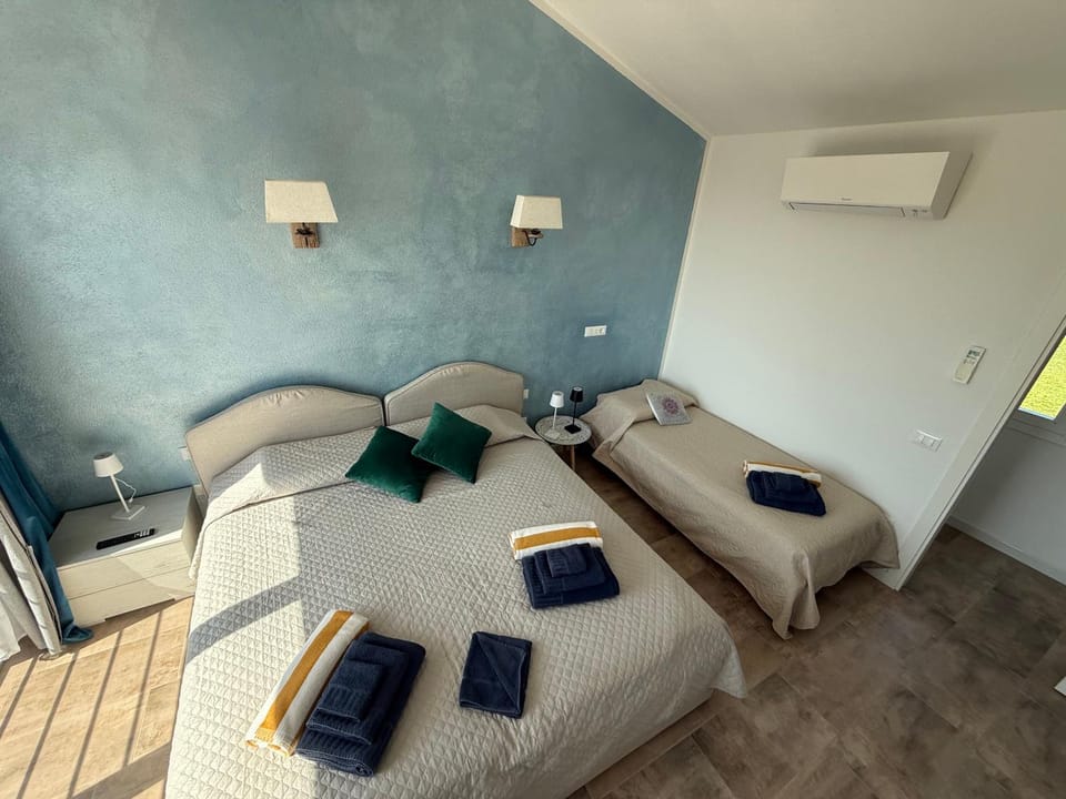 Bed, Photo of the whole room, Bedroom, towels, air conditioner