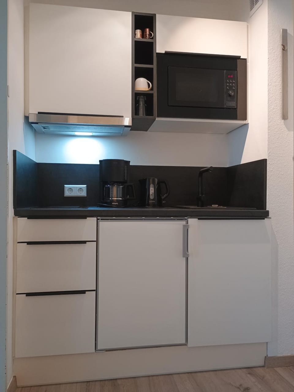 Kitchen or kitchenette, stove