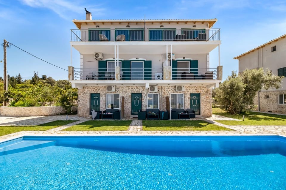 Property building, Living room, Swimming pool