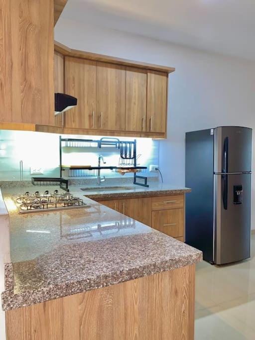 Kitchen or kitchenette, stove