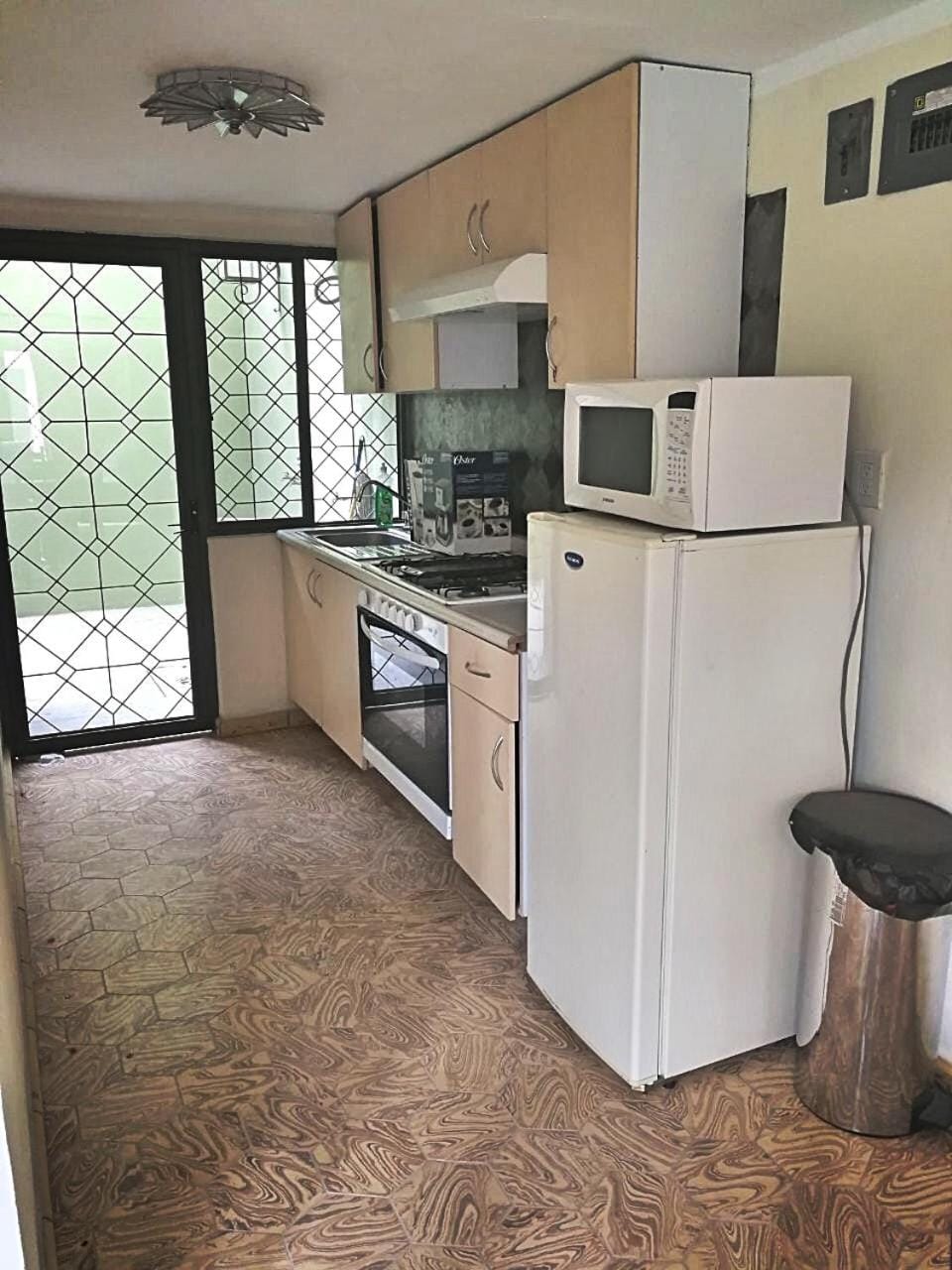 Kitchen or kitchenette, stove