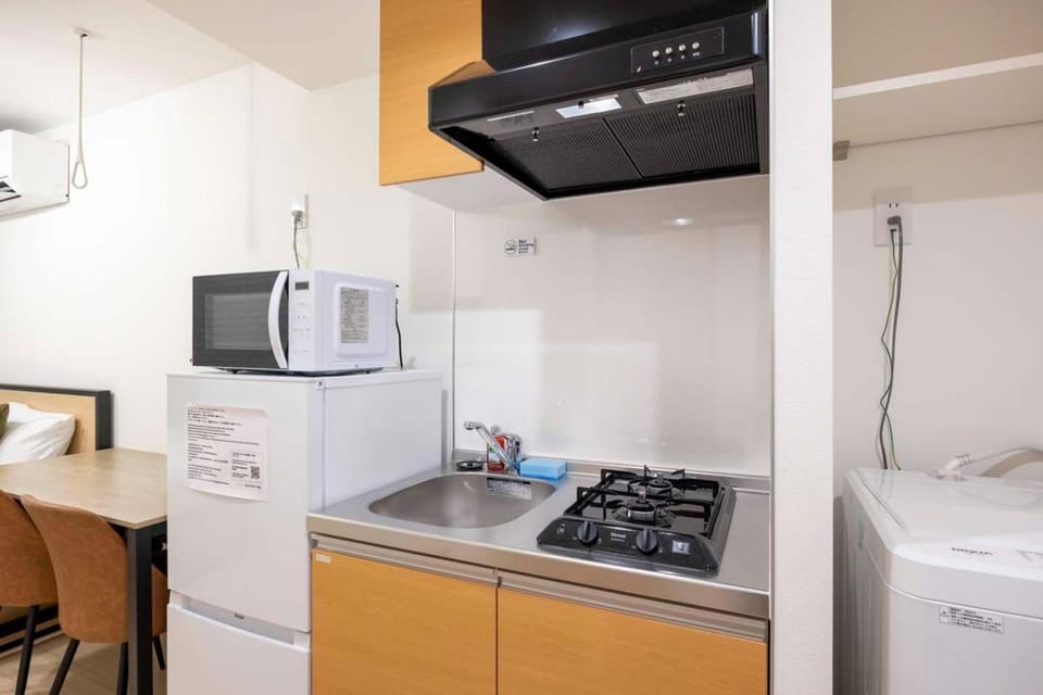 Kitchen or kitchenette, stove