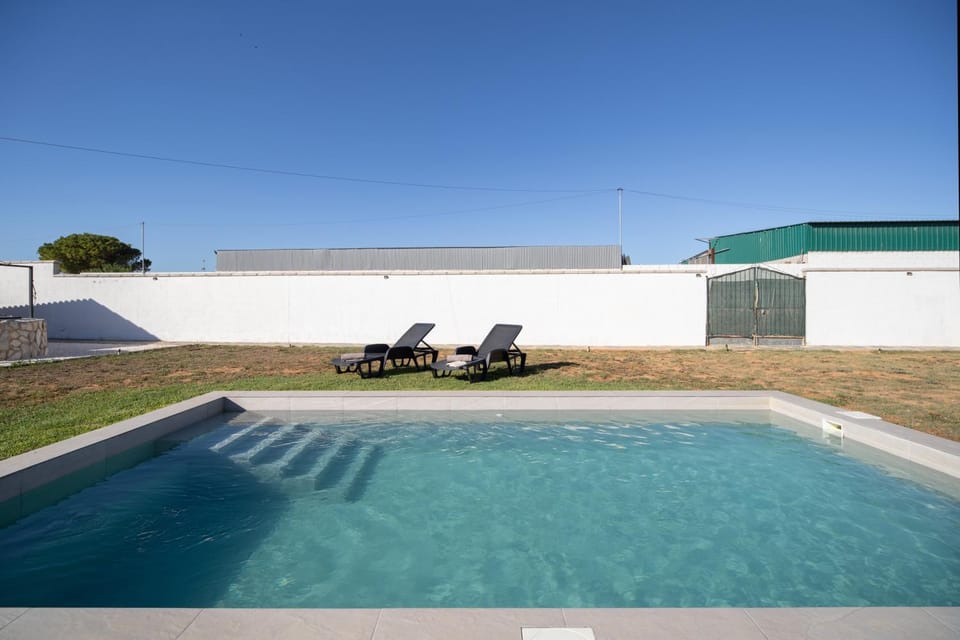 Property building, Living room, Swimming pool