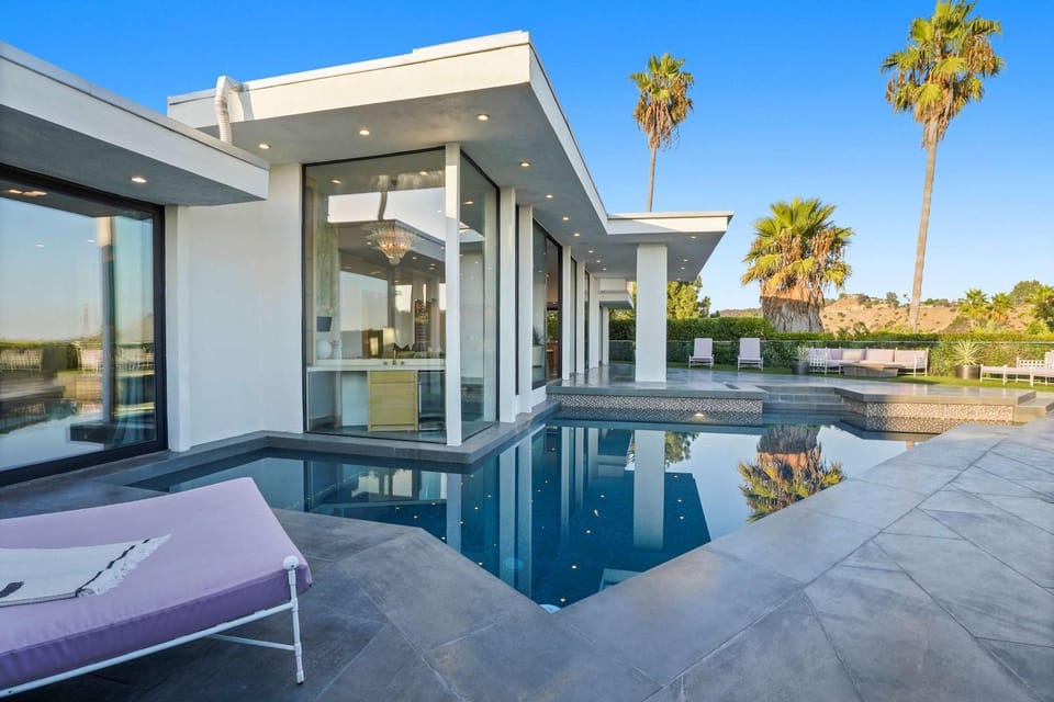 Property building, Patio, Day, Natural landscape, Pool view, Swimming pool, Swimming pool, sunbed