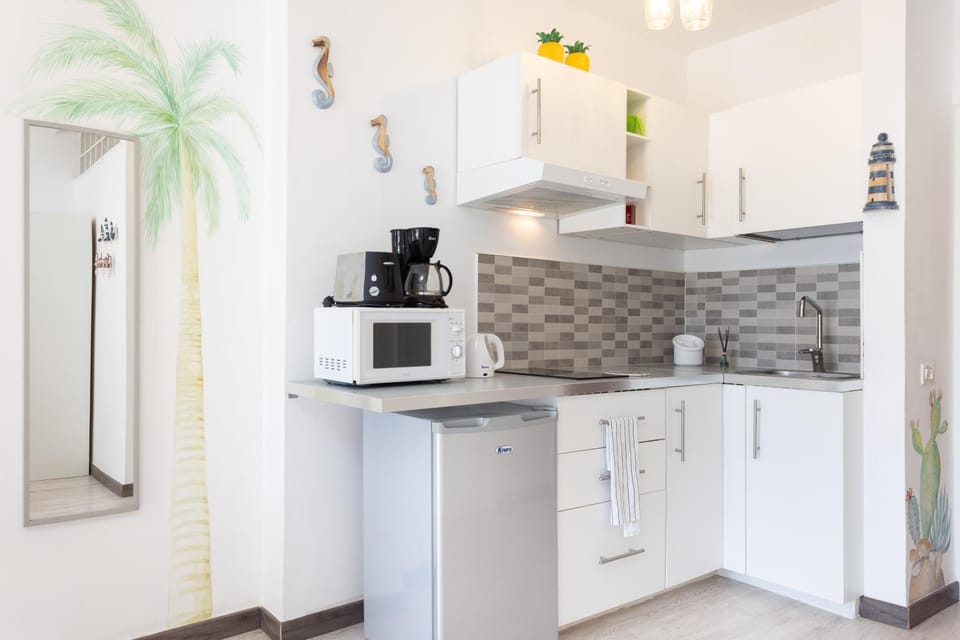 Photo of the whole room, microwave, kitchen