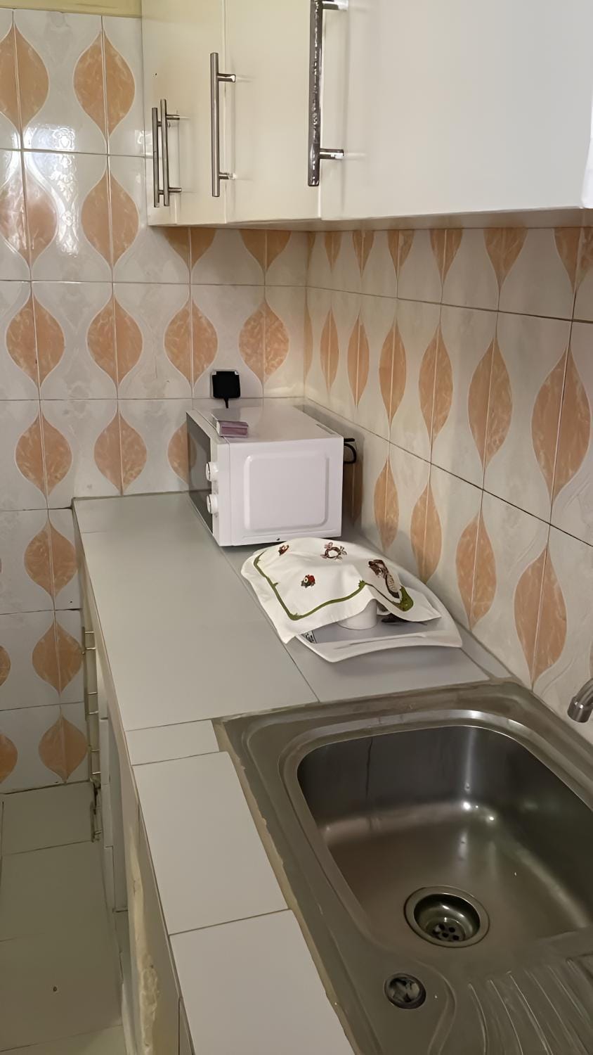 Kitchen or kitchenette, microwave
