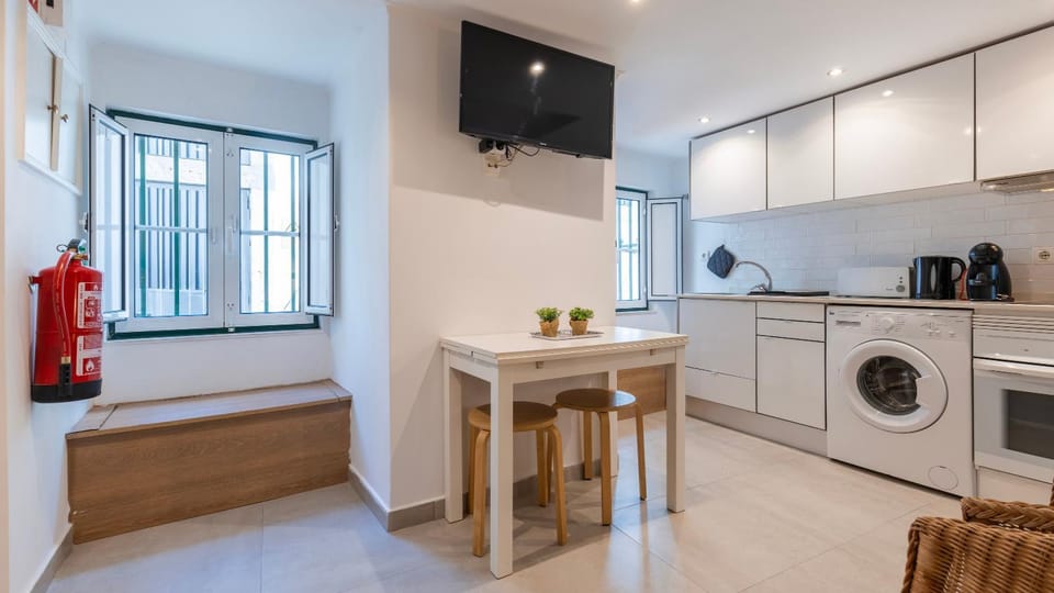 Kitchen or kitchenette, washing machine
