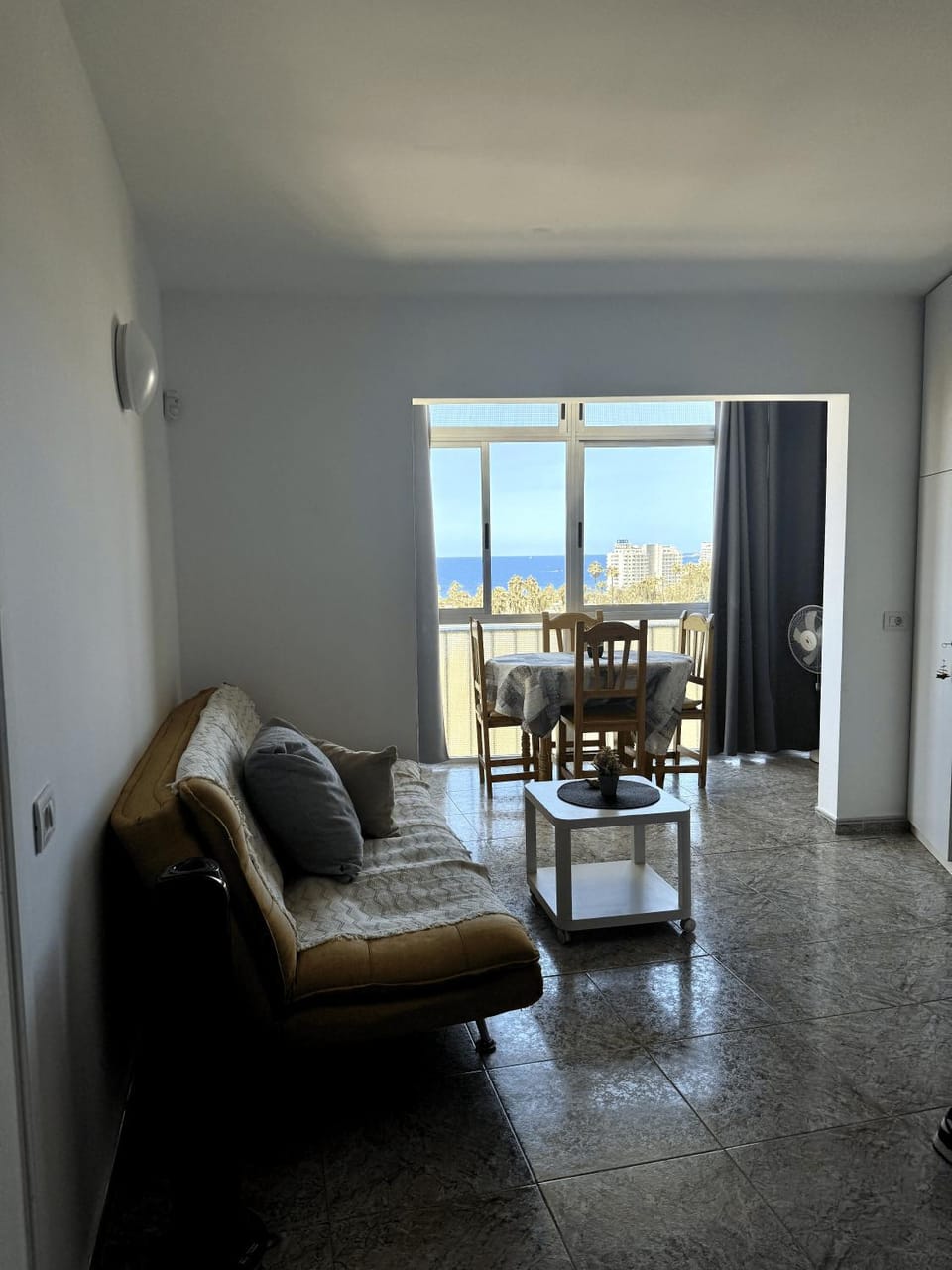 View (from property/room), Living room, Seating area, Dining area, Sea view