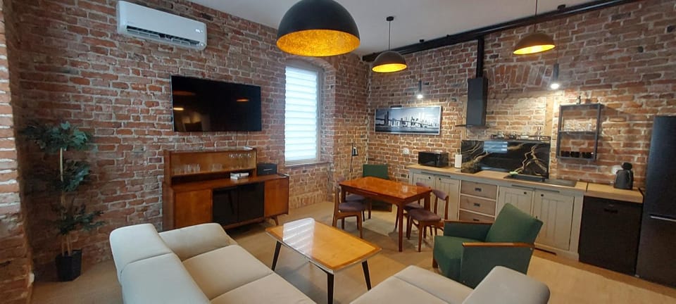 Kitchen or kitchenette, stove, air conditioner