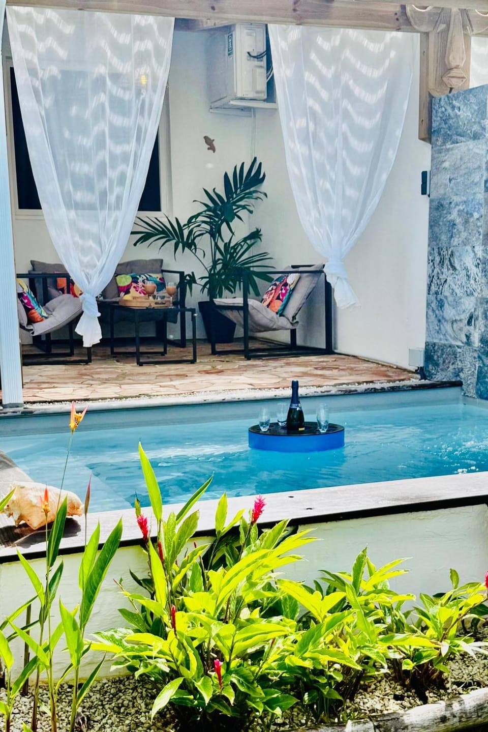 Patio, Day, Natural landscape, Living room, Seating area, Pool view, Swimming pool