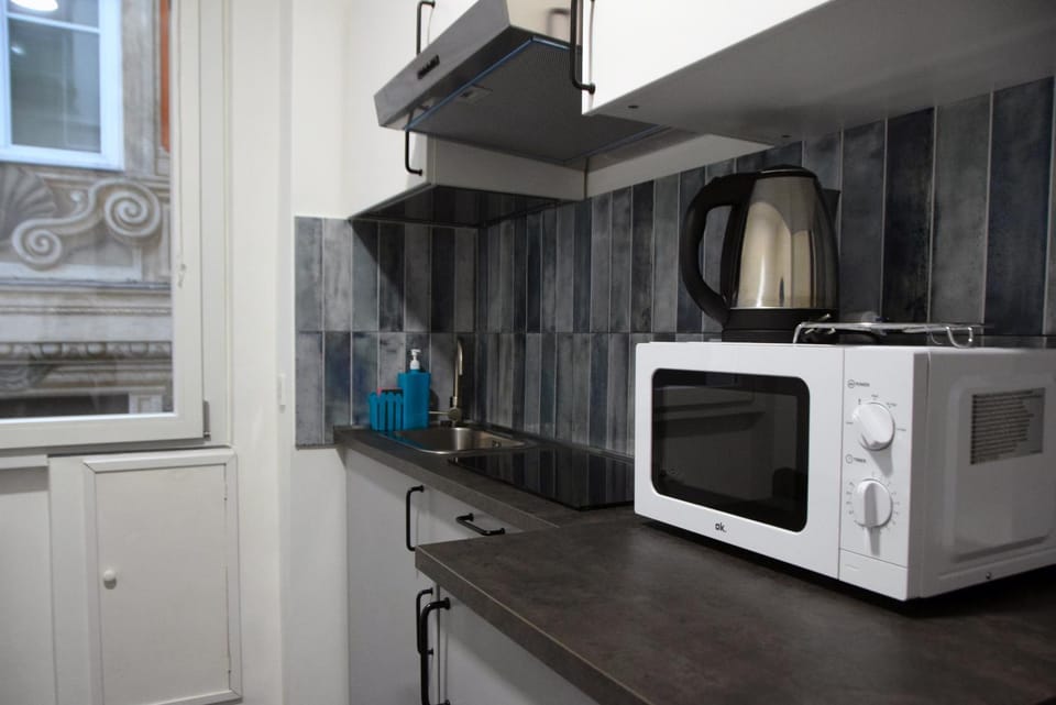 Kitchen or kitchenette, stove